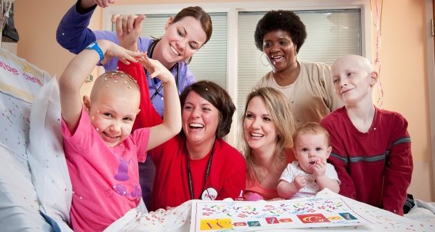 Patients, families, and caregivers celebrating together at St. Jude Children’s Research Hospital