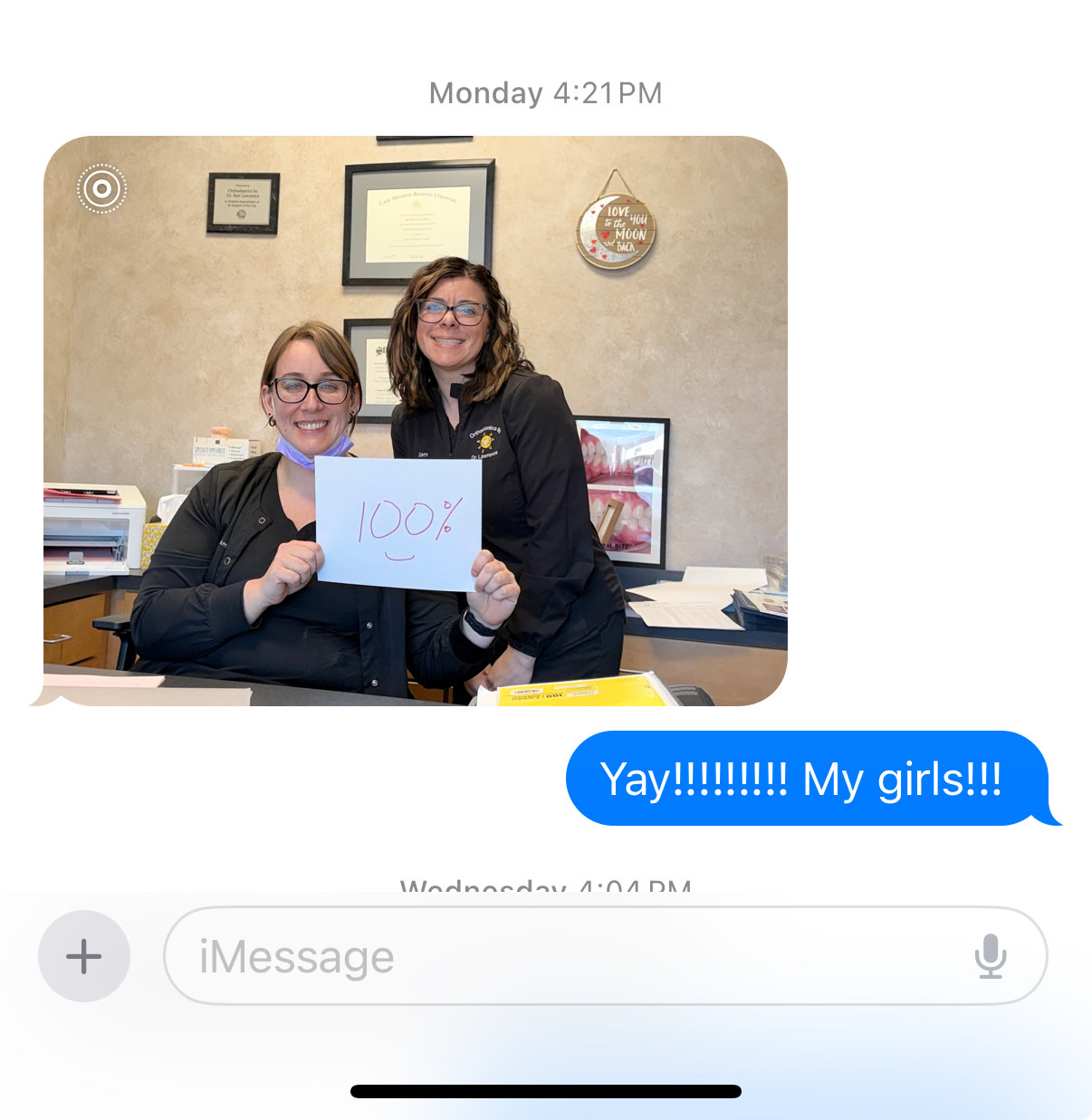 Two TCs holding 100% conversion sign