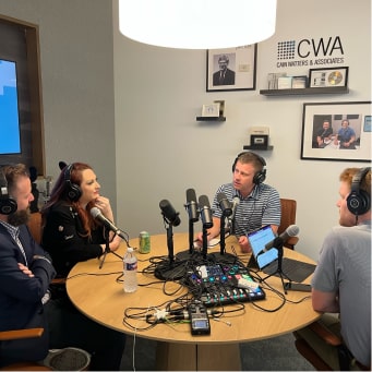 The Straight Consulting team at a radio station